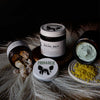 Grass-fed beef tallow Healing Balm product display with some featured ingredients.