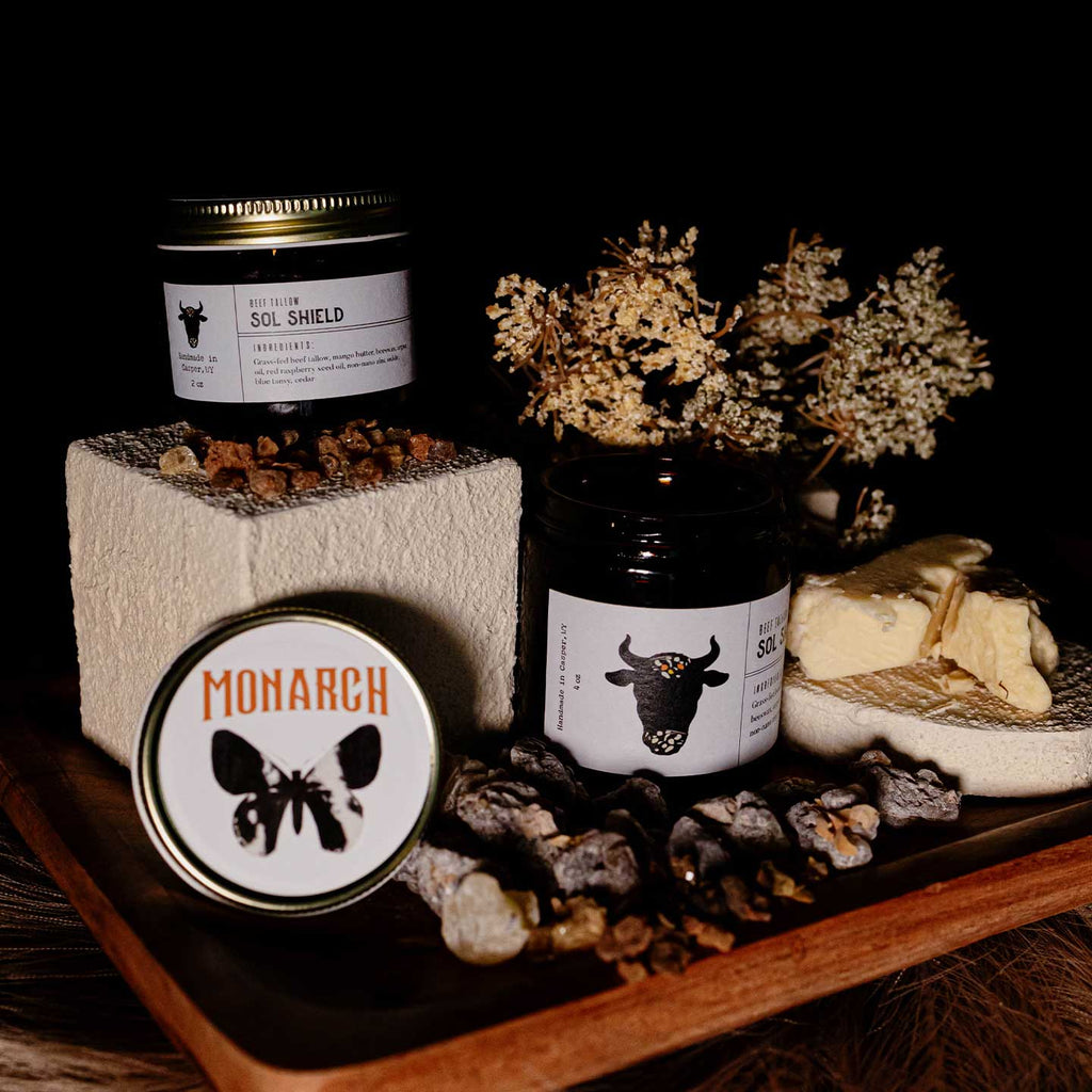Grass-fed beef tallow Sol Shield product display with some featured ingredients.